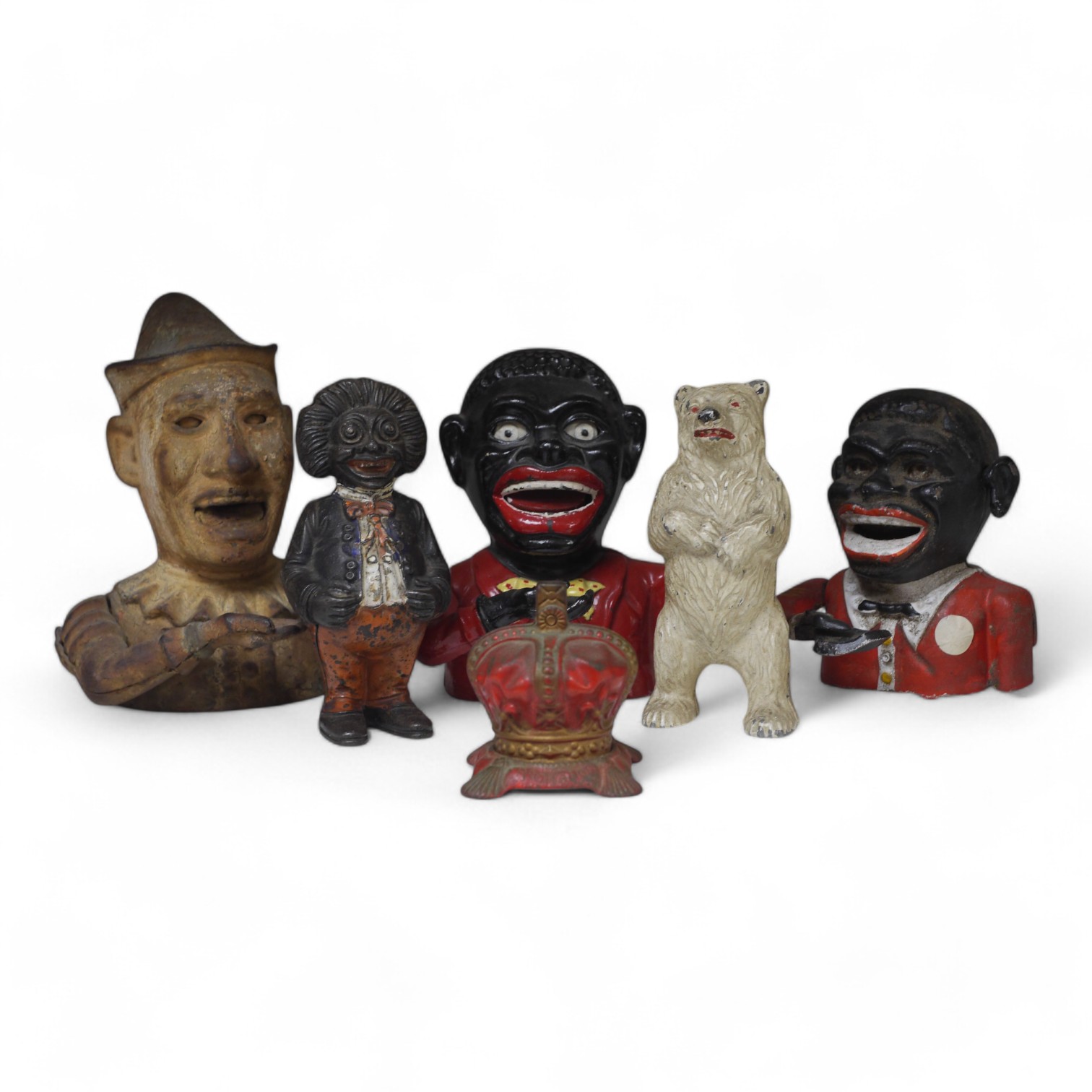 Six various metalware money boxes to include to jolly money banks, standing bear and one in the form of a crown. Condition - fair with general wear